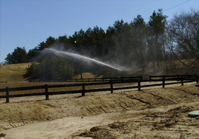 outdoor sand ring install sprinkler system