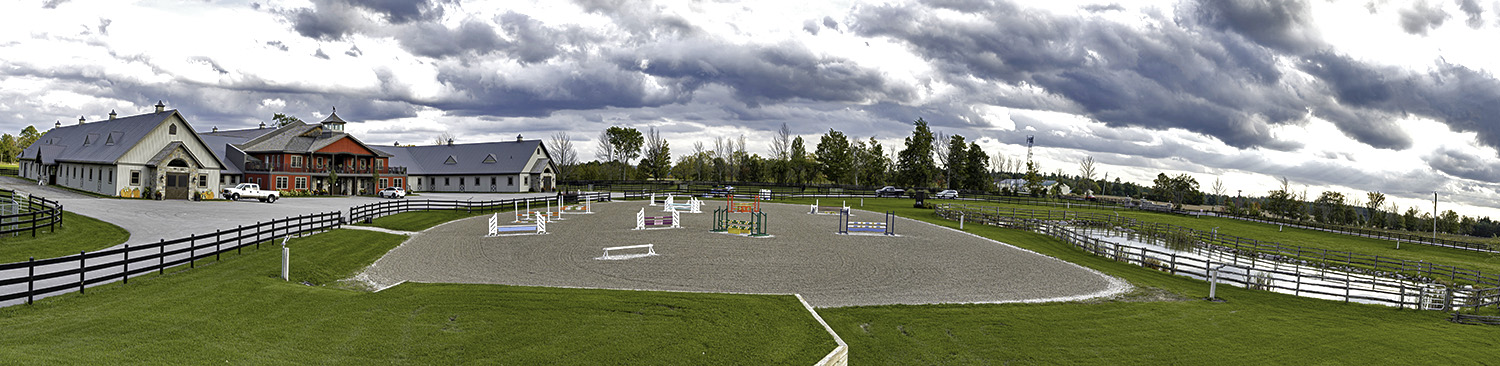 Valhalla Equestrian Centre barns indoor arena and outdoor riding ring by Dutch Masters Design & Construction Ontario